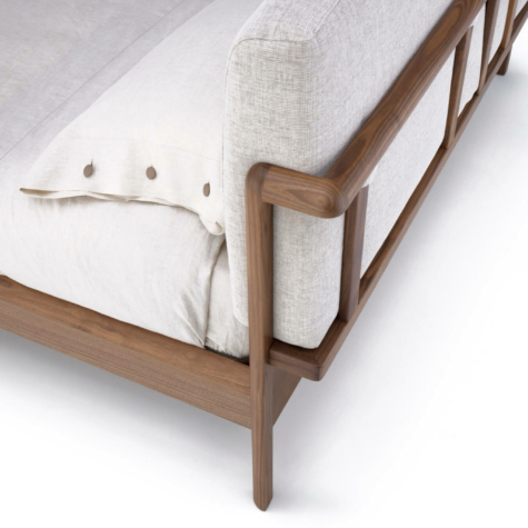 Bed with upholstered elements